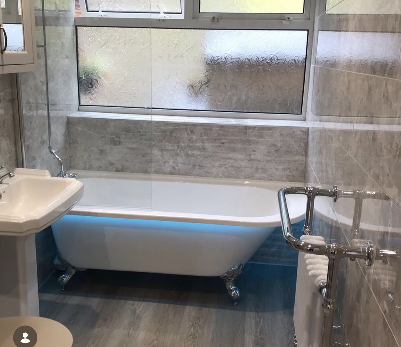 Traditional freestanding clawfoot bath with chrome fittings by M3 Trades