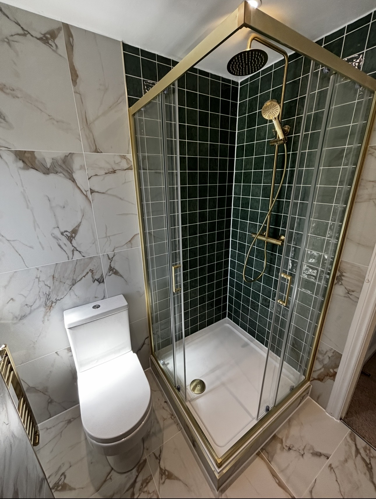 Green & brass corner shower — Stourbridge — upstairs bathroom by M3 Trades