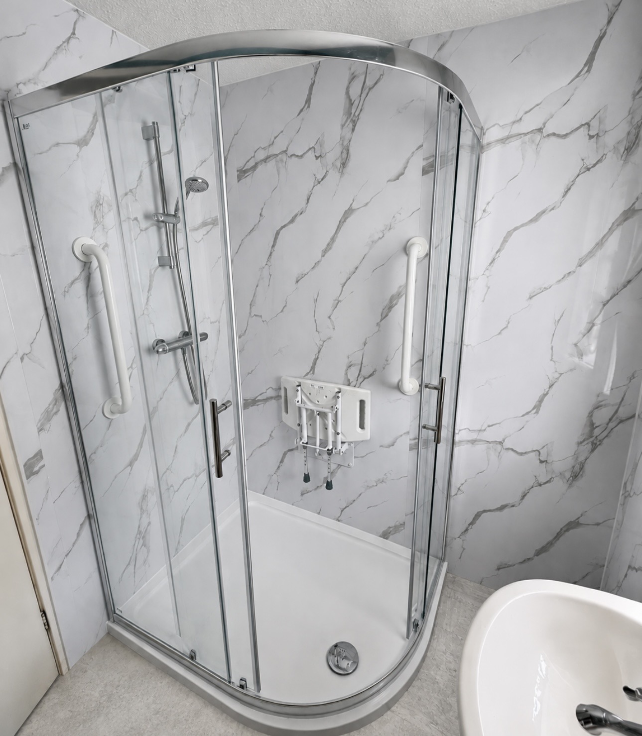 Level-access adapted bathroom installed by M3 Trades in Lichfield